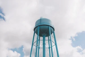 Home 16 blue water tower sky and clouds in background sa 2026 03 25 01 38 38 utc