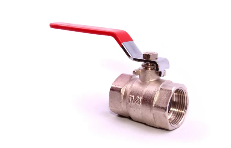 metal water valve with red handle on white 2026 03 19 06 59 08 utc